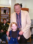 Bill Wallace with young reader