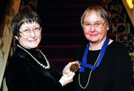 Arrell Gibson Award recipient Carolyn Hart with presenter Eve Sandstrom